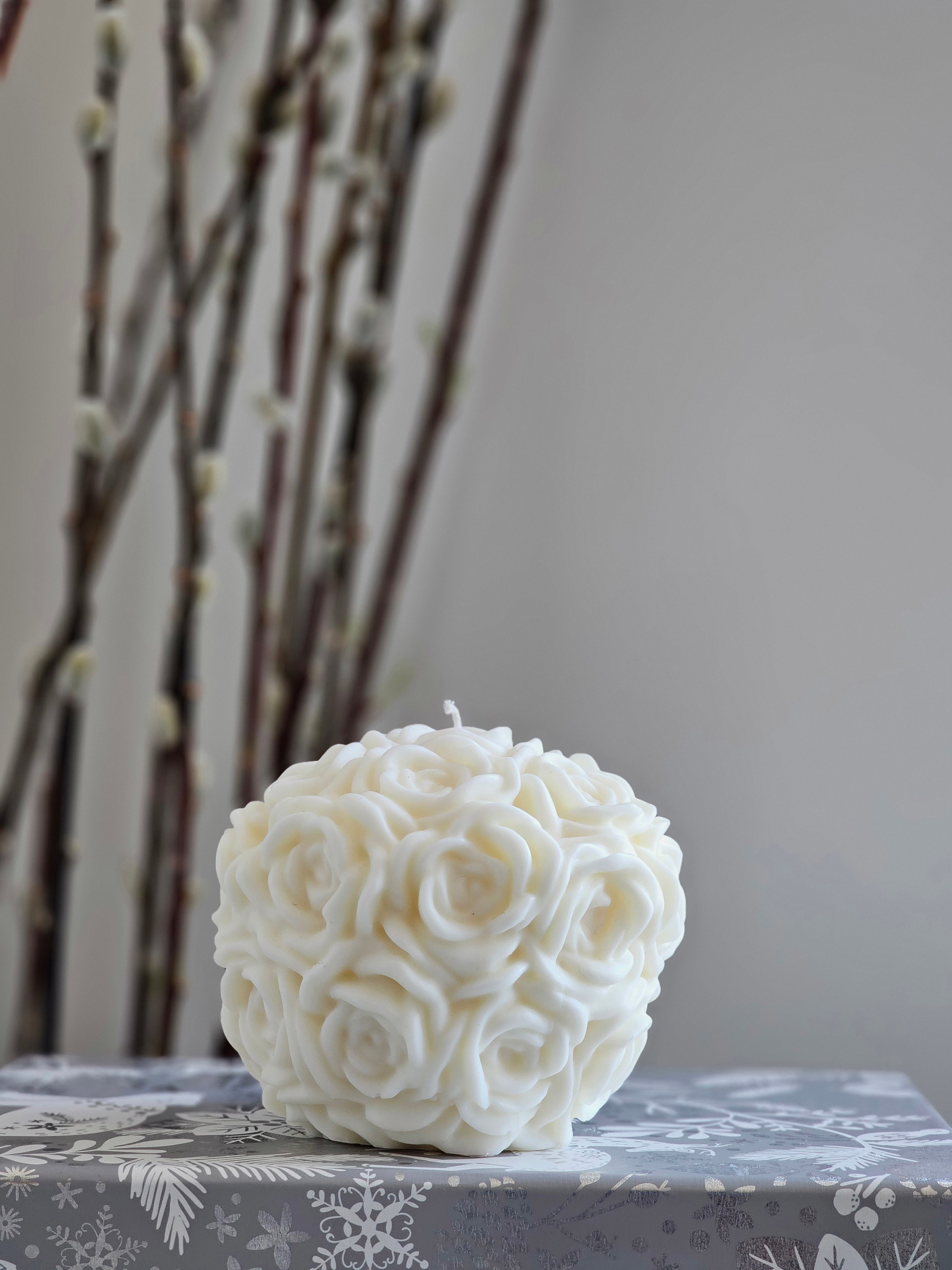 Vela de bola de flores